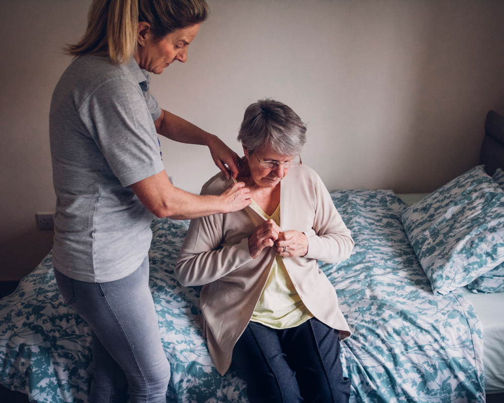 carer providing personal care to patient