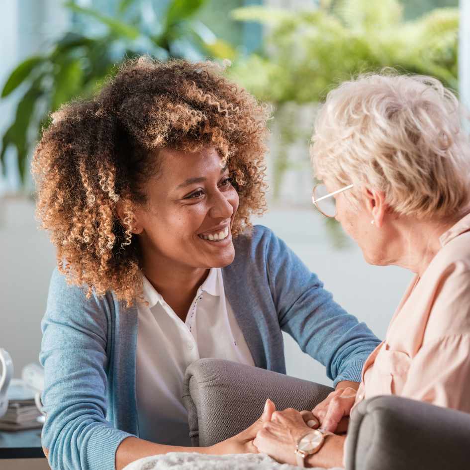 carer helping elderly lady in home with A Star Care home care in Birmingham